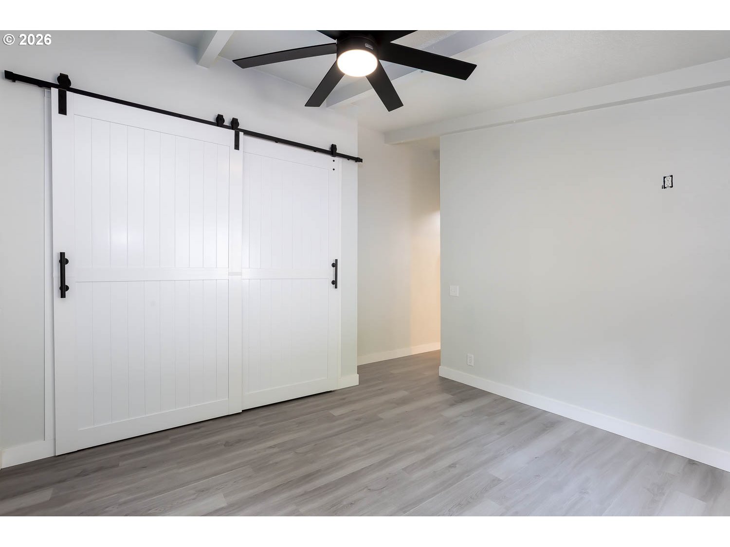 48187 McFarland Road Oakridge, OR 97463 - Photo 34 of 41 a view of an empty room with wooden floor