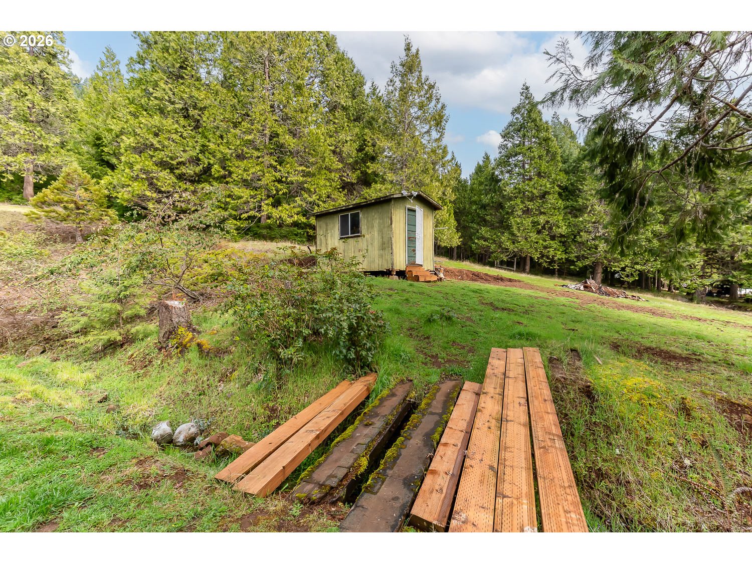48187 McFarland Road Oakridge, OR 97463 - Photo 8 of 41 a view of backyard with wooden floor and fence