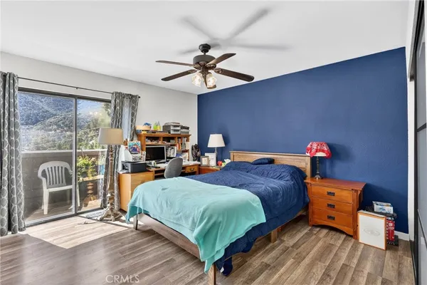 a bedroom with a bed and a closet