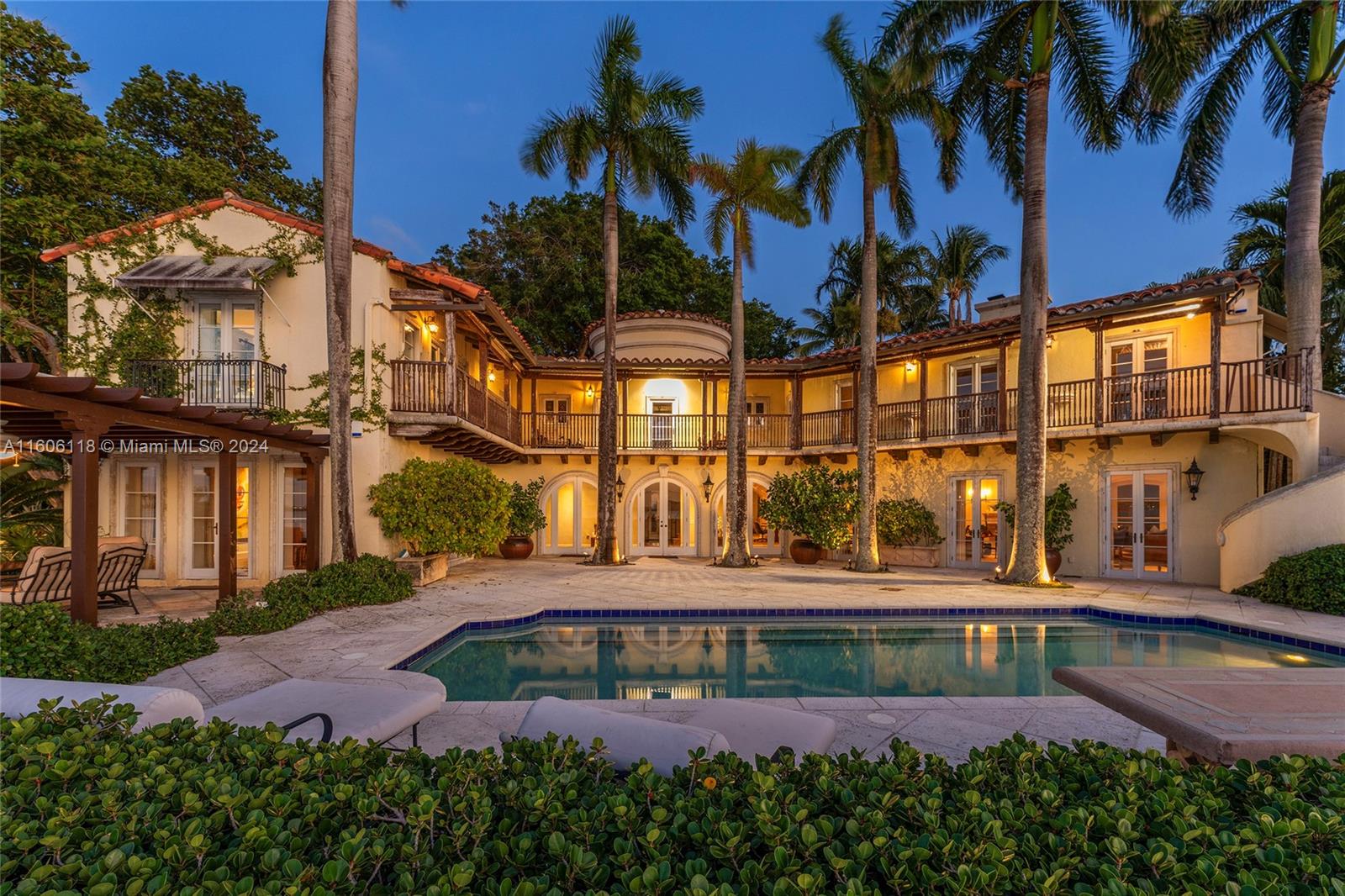 4810 North Bay Road Miami Beach, FL 33140 - Photo 11 of 61 front view of a building with a yard