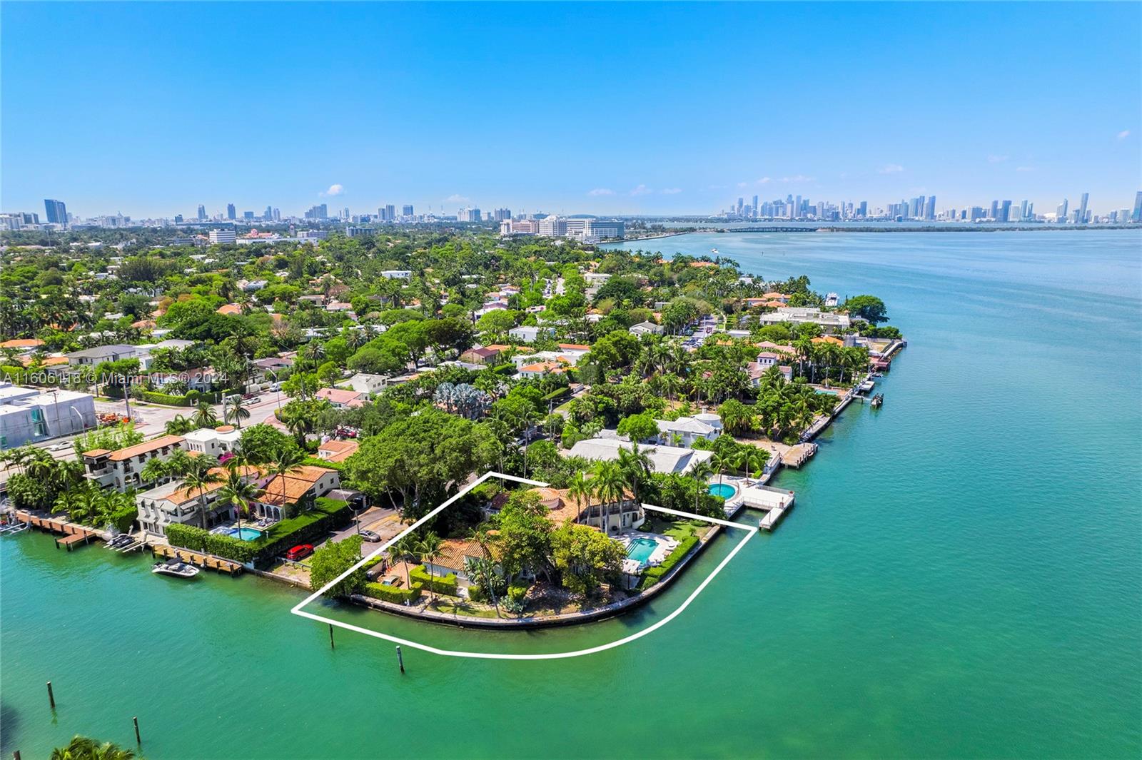 4810 North Bay Road Miami Beach, FL 33140 - Photo 13 of 61 a view of a lake with a city
