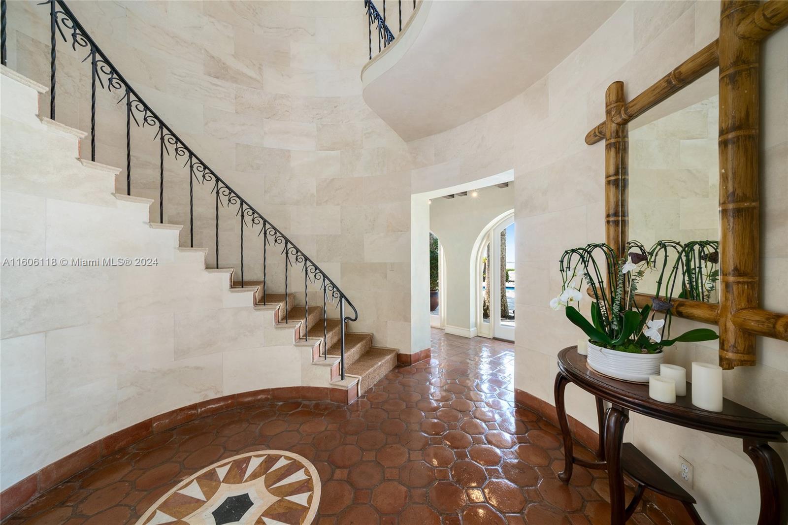 4810 North Bay Road Miami Beach, FL 33140 - Photo 34 of 61 a view of entryway and hall with wooden floor