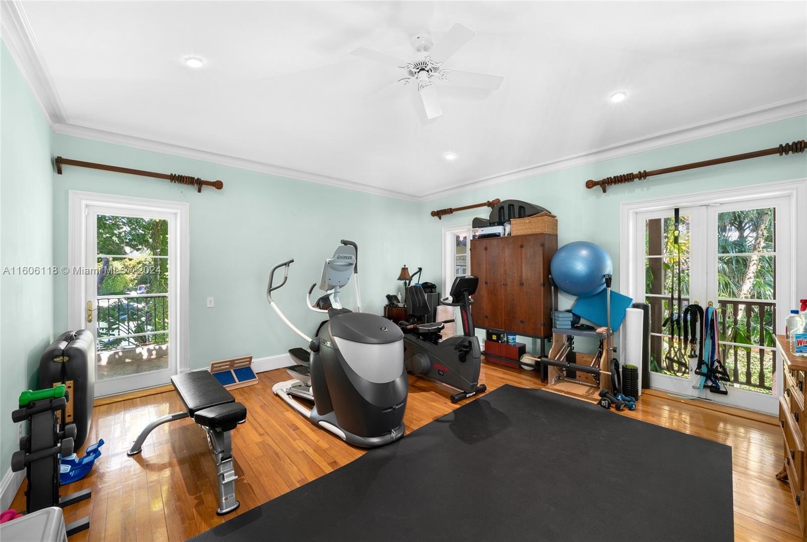4810 North Bay Road Miami Beach, FL 33140 - Photo 42 of 61 a view of a room with gym equipment