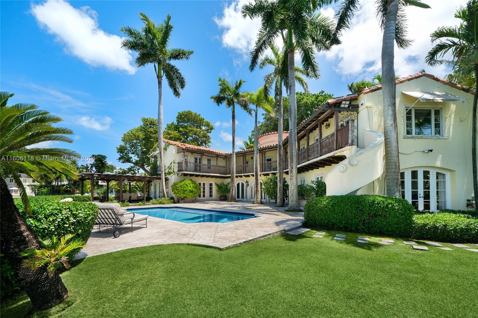 4810 North Bay Road Miami Beach, FL 33140 - Photo 47 of 61 a view of a house with a yard