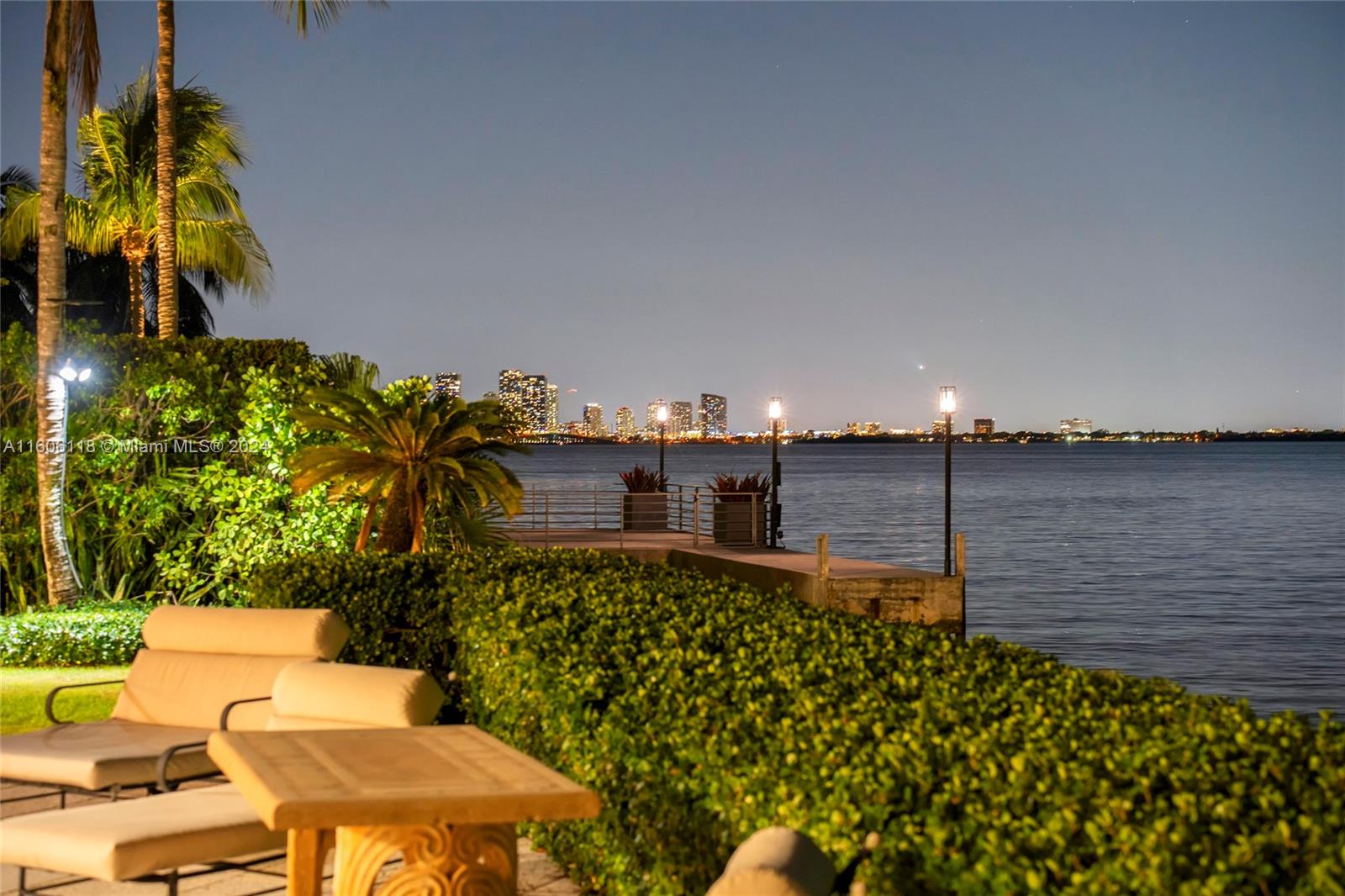 4810 North Bay Road Miami Beach, FL 33140 - Photo 58 of 61 a view of a balcony with chairs