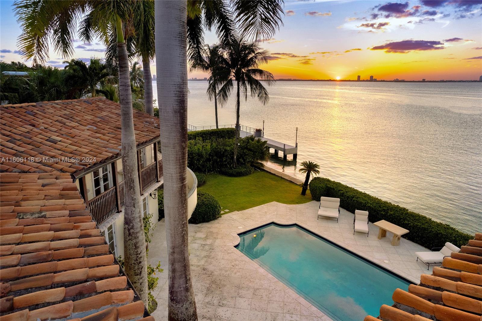 4810 North Bay Road Miami Beach, FL 33140 - Photo 8 of 61 a view of a ocean with palm trees