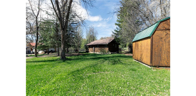 1105 Litz Road Preston, ID 83263 - Photo 23 of 24 View of grassy yard with an outdoor structure