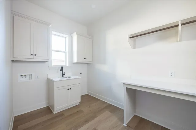 a view of bathroom with dual sinks