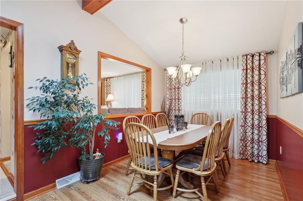 158 Maple Street Rochester, PA 15074 - Photo 11 of 37 a view of a dining room with furniture and chandelier
