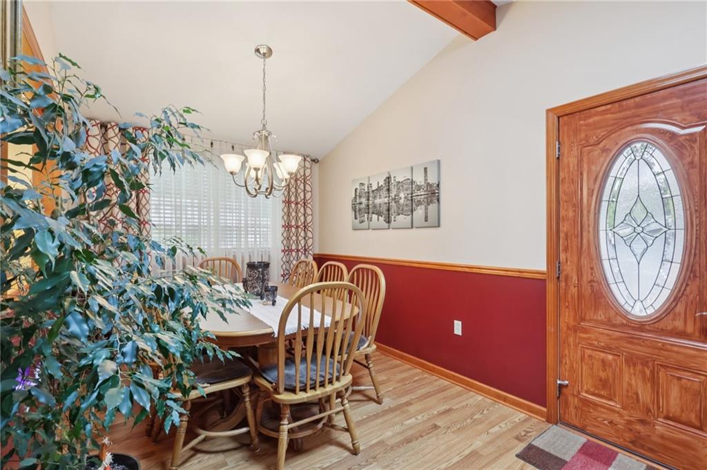 158 Maple Street Rochester, PA 15074 - Photo 12 of 37 a view of a dining room with furniture and chandelier