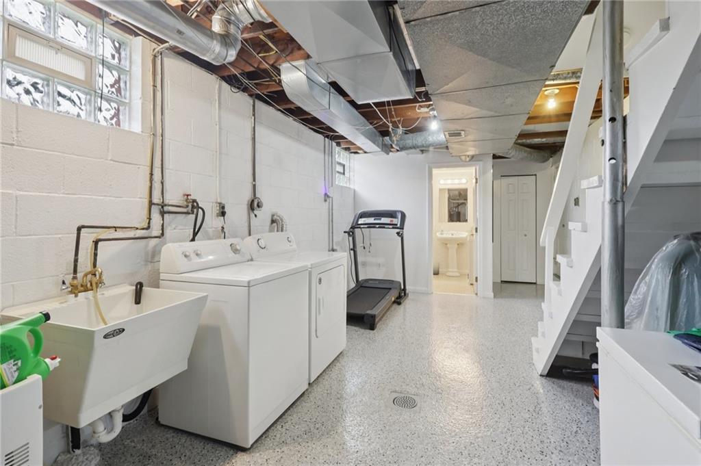158 Maple Street Rochester, PA 15074 - Photo 28 of 37 a bathroom with double vanity and a bathtub