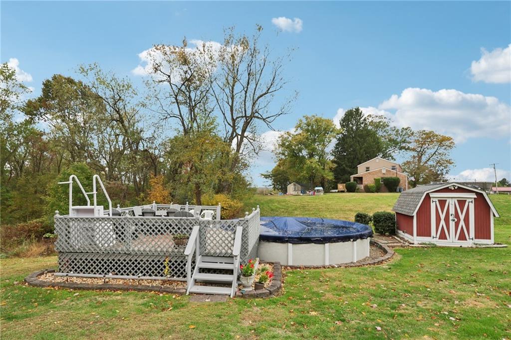 158 Maple Street Rochester, PA 15074 - Photo 31 of 37 a view of a two chair and table in the grass