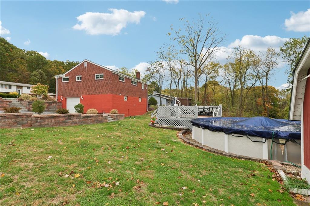 158 Maple Street Rochester, PA 15074 - Photo 32 of 37 a view of a house with a yard