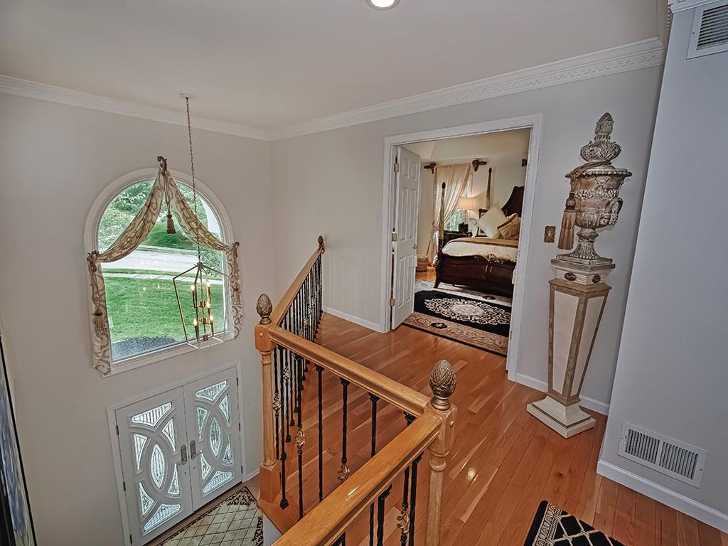 7002 Eagle Road Gibsonia, PA 15044 - Photo 20 of 49 a view of a livingroom with furniture and hardwood floor