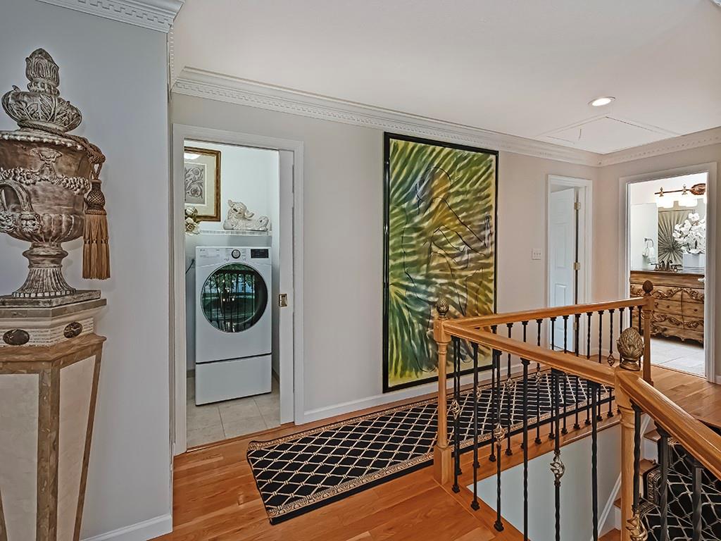 7002 Eagle Road Gibsonia, PA 15044 - Photo 21 of 49 a view of a hallway with wooden floor and windows