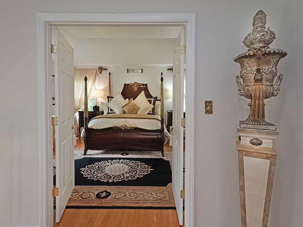 7002 Eagle Road Gibsonia, PA 15044 - Photo 23 of 49 a bedroom with a bed and a lamp on dresser