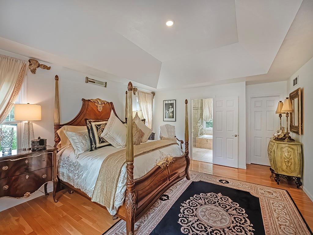 7002 Eagle Road Gibsonia, PA 15044 - Photo 24 of 49 a bed room with a bed and a lamp