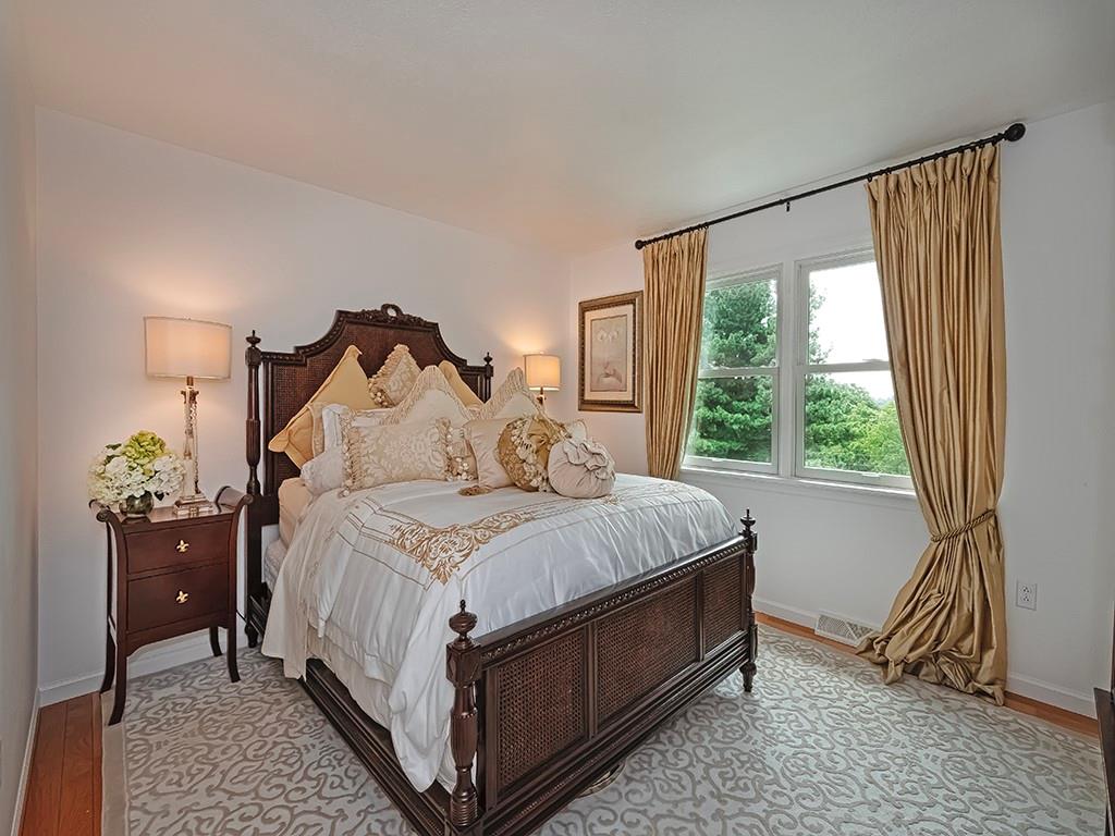 7002 Eagle Road Gibsonia, PA 15044 - Photo 28 of 49 a bed sitting in a bedroom next to a window