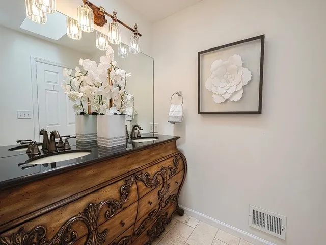 a bedroom with a bed and a shower