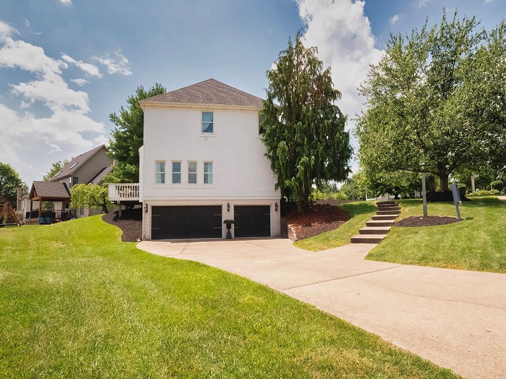7002 Eagle Road Gibsonia, PA 15044 - Photo 40 of 49 a view of a house with pool and a yard