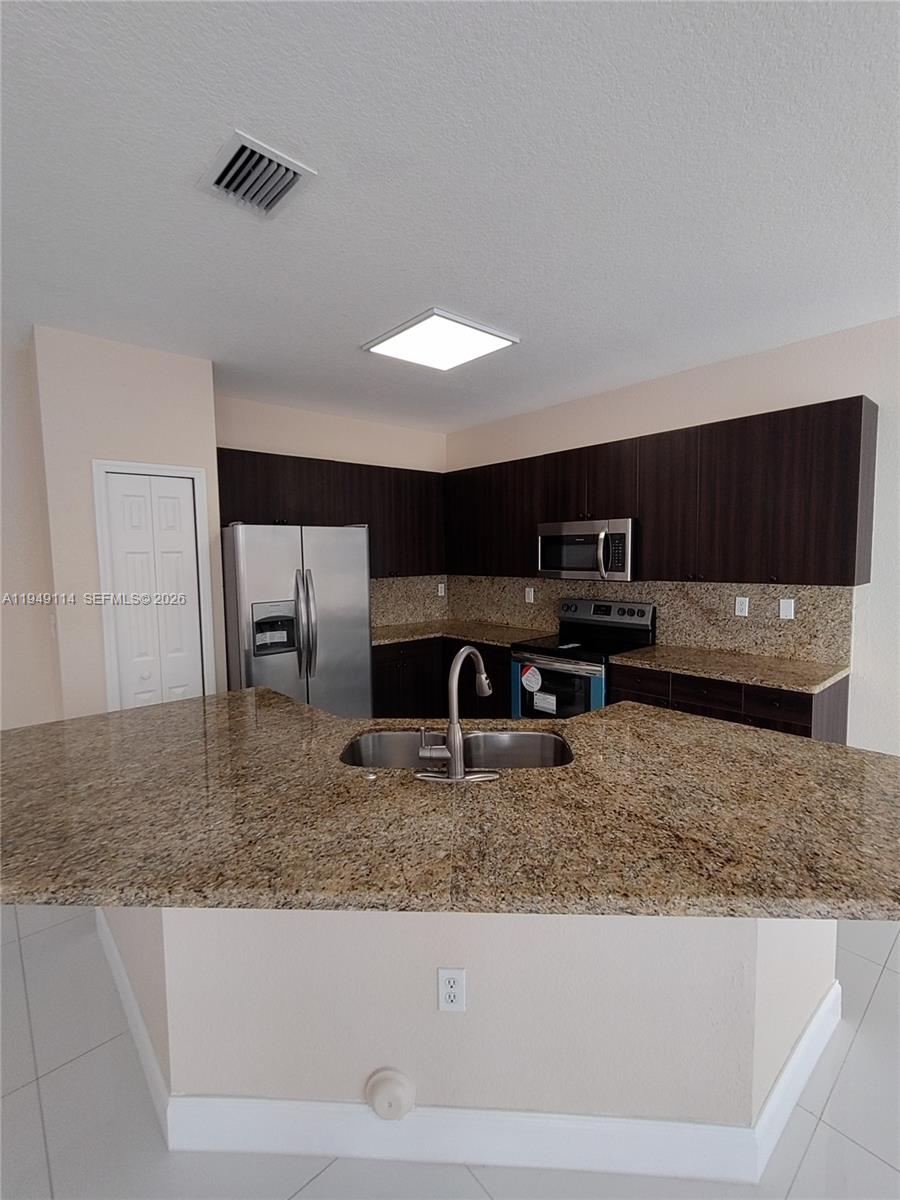 8546 Southwest 165th Place Miami, FL 33193 - Photo 4 of 40