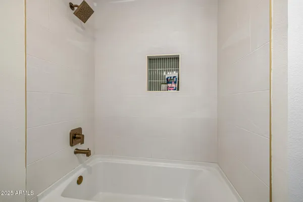 a bathroom with a bathtub