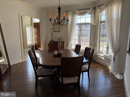 a bedroom with bed and a flat tv screen