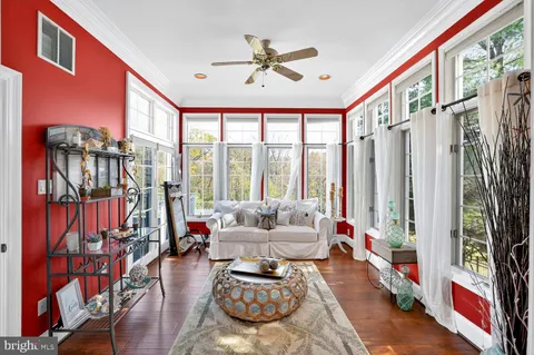 a view of walk in closet and bathroom