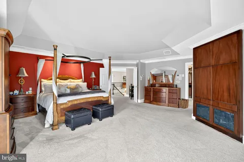 a bathroom with a double vanity sink mirror and shower