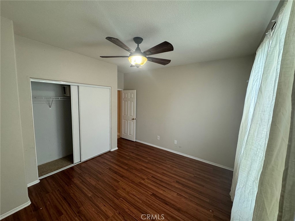 31970 Cercle Chambertin Temecula, CA 92591 - Photo 15 of 45 a view of empty room with wooden floor