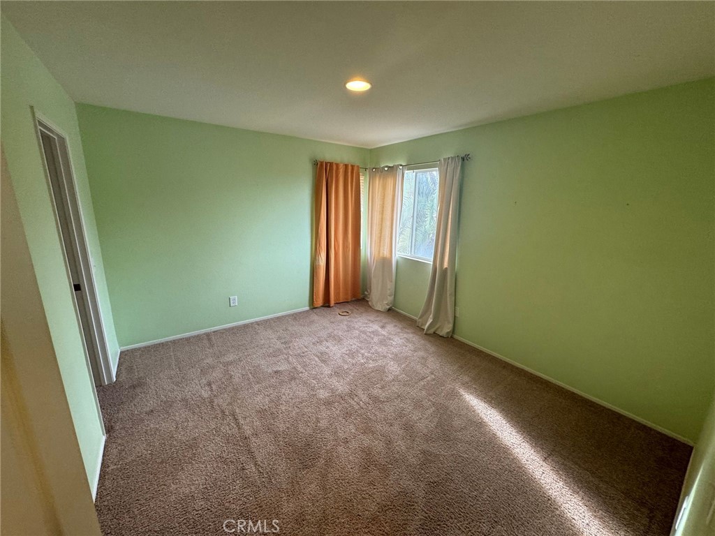 31970 Cercle Chambertin Temecula, CA 92591 - Photo 23 of 45 an empty room with windows