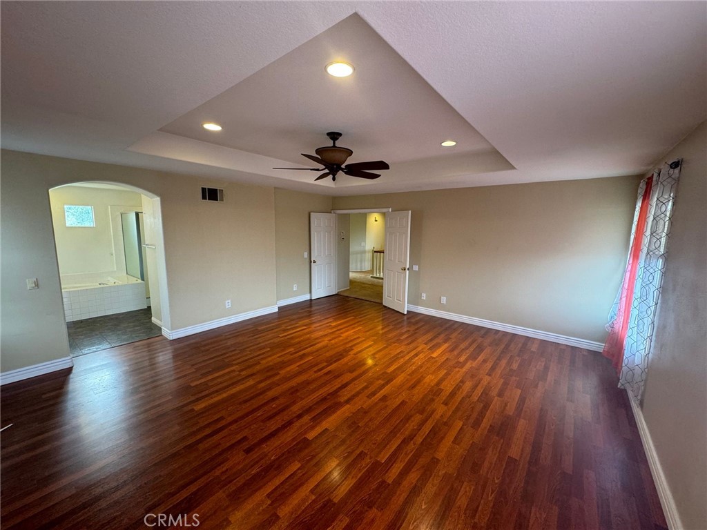 31970 Cercle Chambertin Temecula, CA 92591 - Photo 31 of 45 a view of empty room with wooden floor