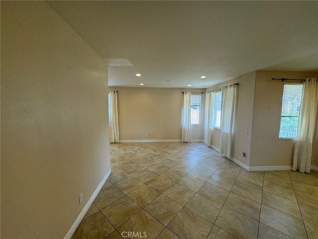 31970 Cercle Chambertin Temecula, CA 92591 - Photo 6 of 45 a view of an empty room and window