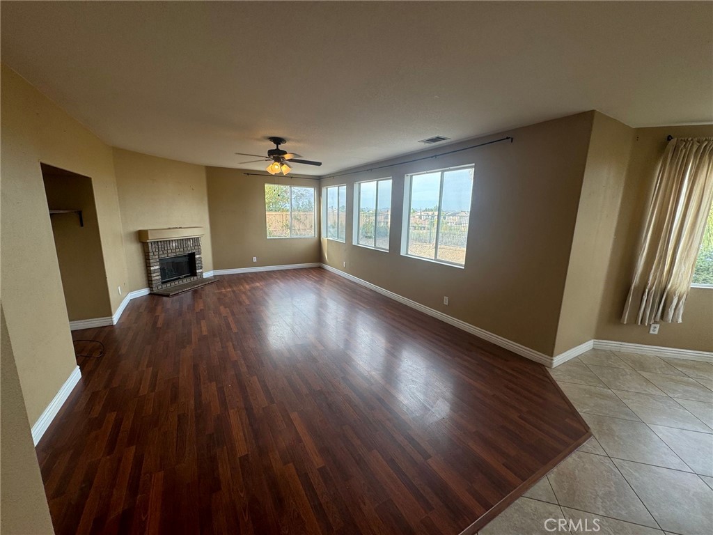 31970 Cercle Chambertin Temecula, CA 92591 - Photo 9 of 45 wooden floor in an empty room with a window