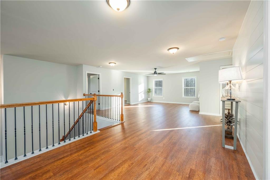 5875 Chestnut Drive Cumming, GA 30040 - Photo 30 of 55 a view of a livingroom with wooden floor