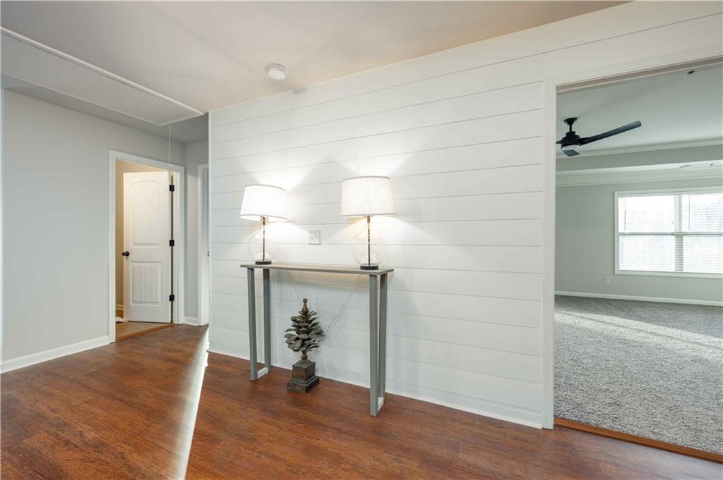 5875 Chestnut Drive Cumming, GA 30040 - Photo 32 of 55 a view of empty room with wooden floor