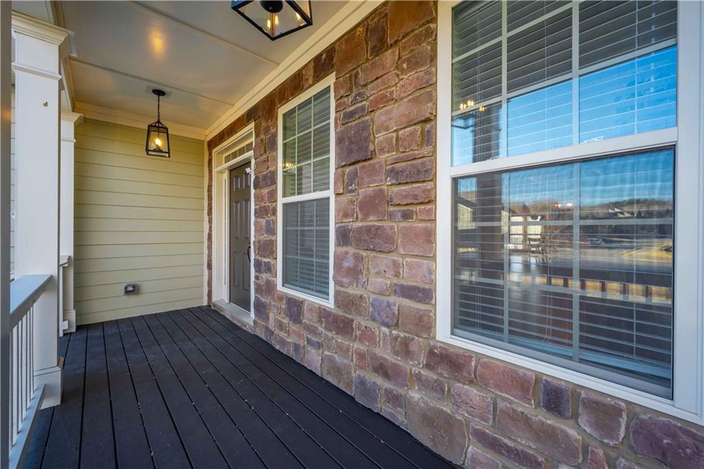 5875 Chestnut Drive Cumming, GA 30040 - Photo 8 of 55 a view of wooden door with a window