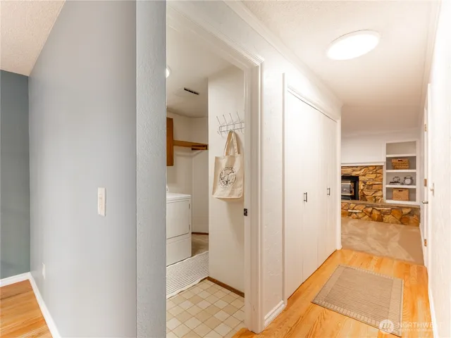 a view of a kitchen from the hallway