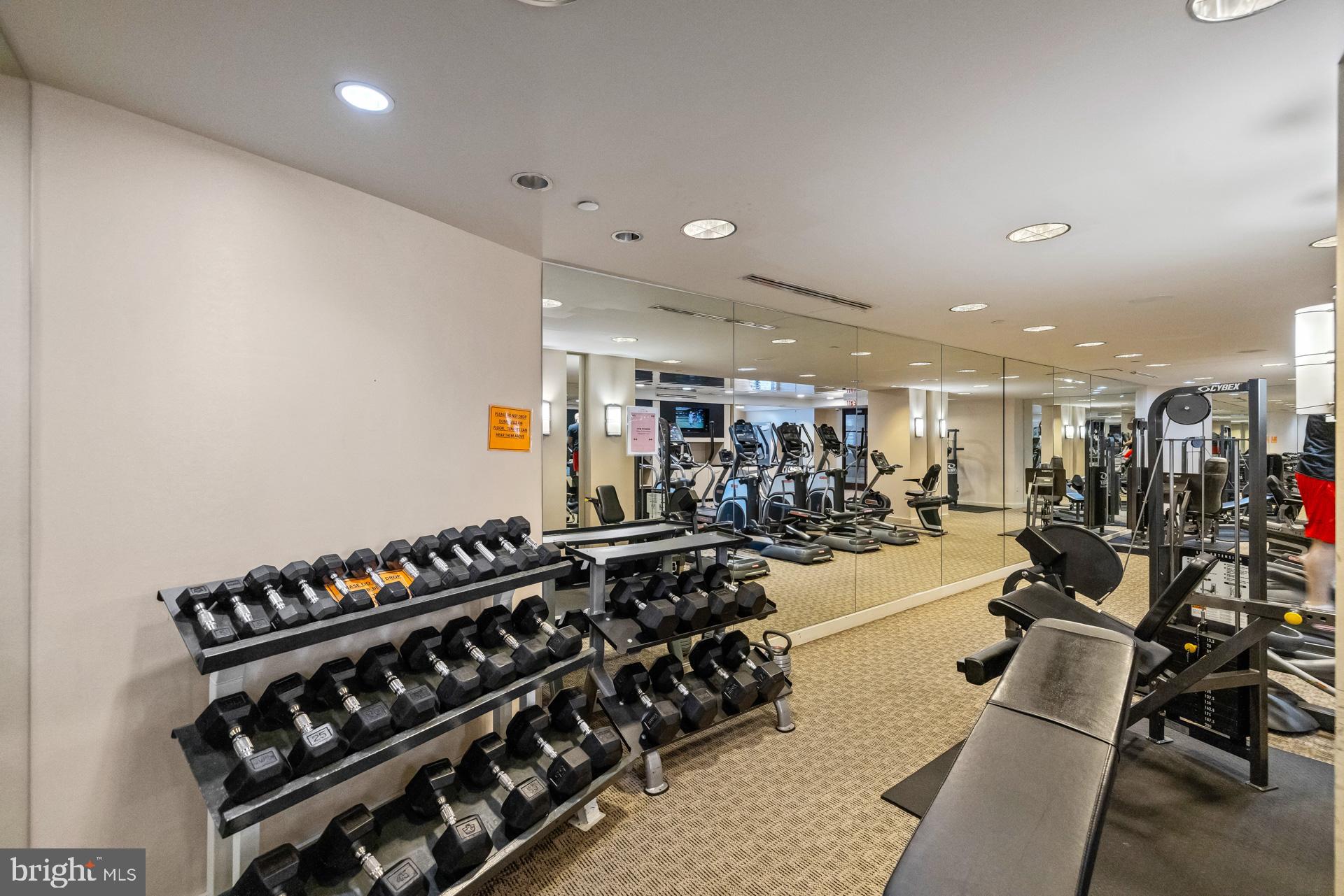 11710 Old Georgetown Road, Unit 1116W North Bethesda, MD 20852 - Photo 42 of 52 Modern fitness center with sleek equipment.
