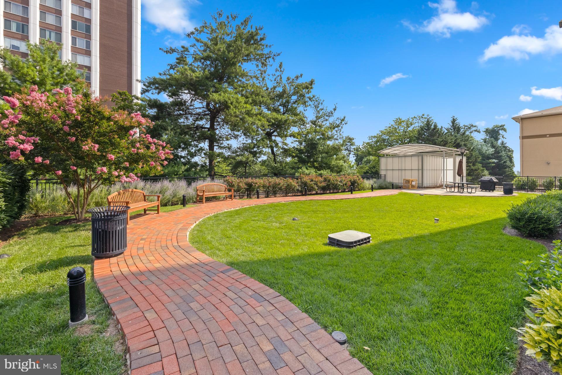 11710 Old Georgetown Road, Unit 1116W North Bethesda, MD 20852 - Photo 48 of 52 a view of a house with a yard