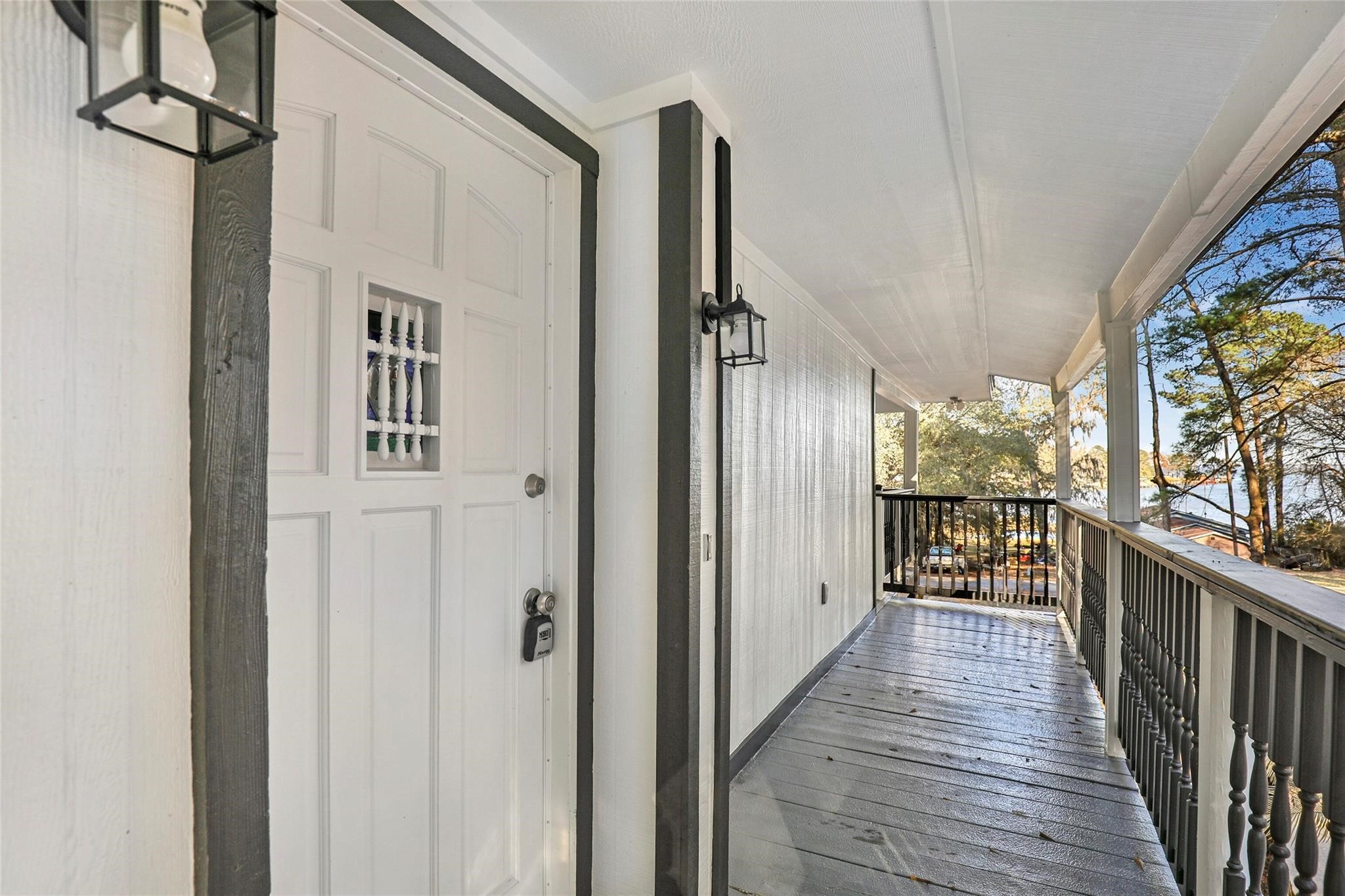 1 Mill Creek Road Point Blank, TX 77364 - Photo 20 of 43 a view of a balcony with wooden floor