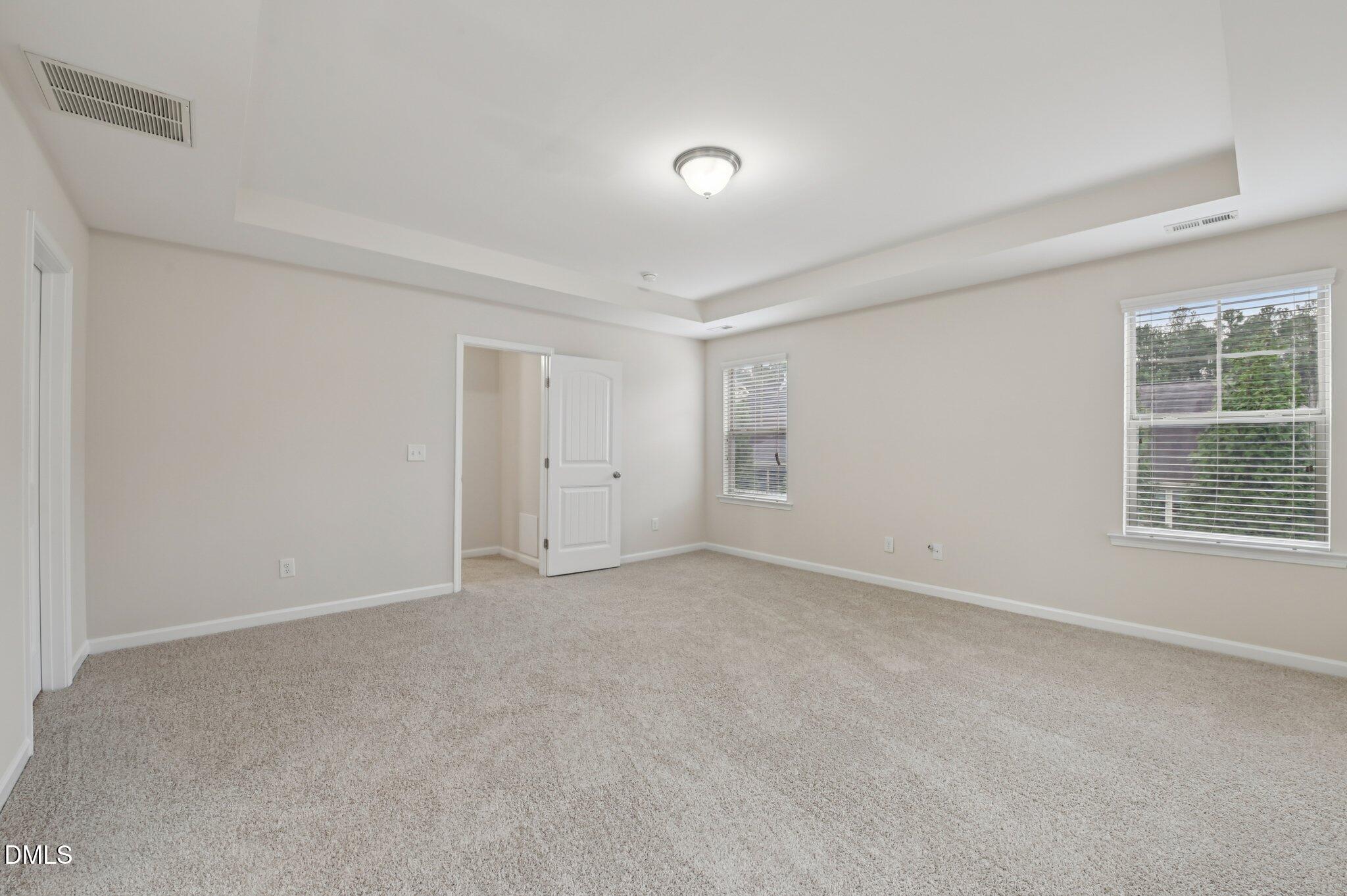 1024 Laredo Lane Durham, NC 27703 - Photo 16 of 32 a view of an empty room with a window