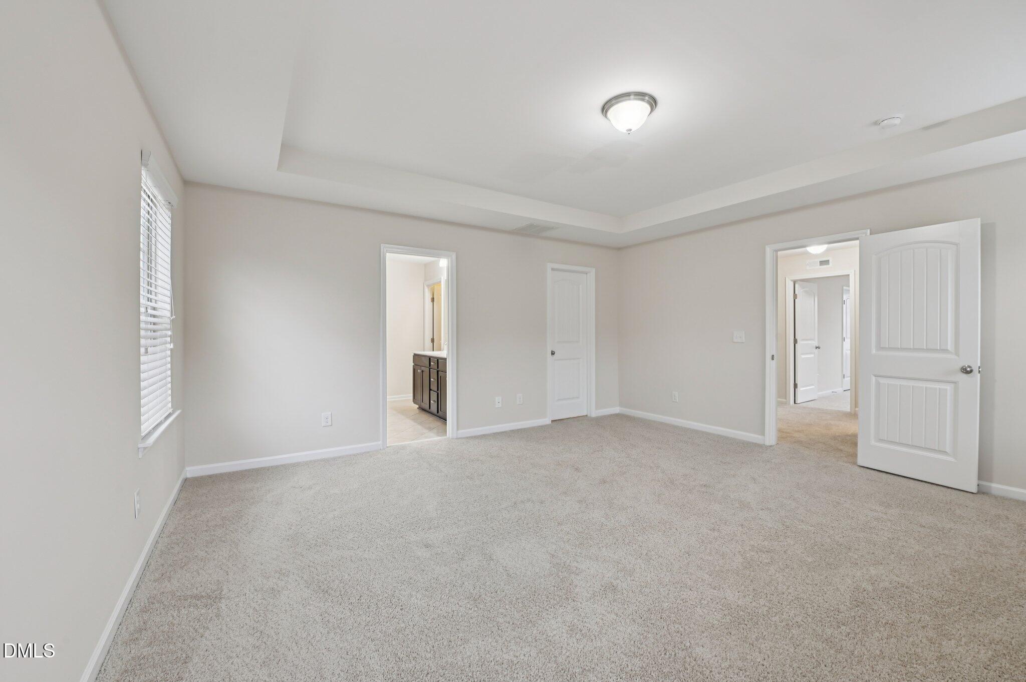 1024 Laredo Lane Durham, NC 27703 - Photo 17 of 32 a view of an empty room and window