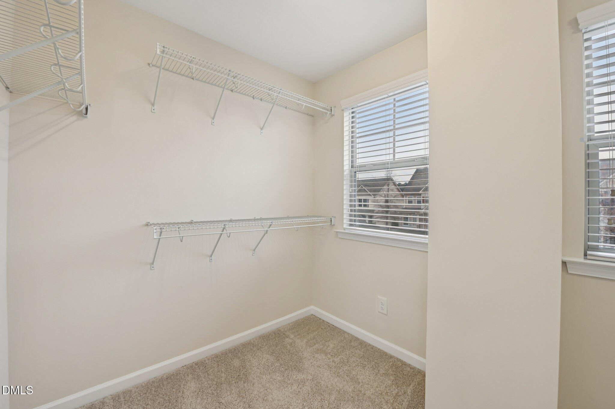 1024 Laredo Lane Durham, NC 27703 - Photo 18 of 32 a view of a room with racks on the wall