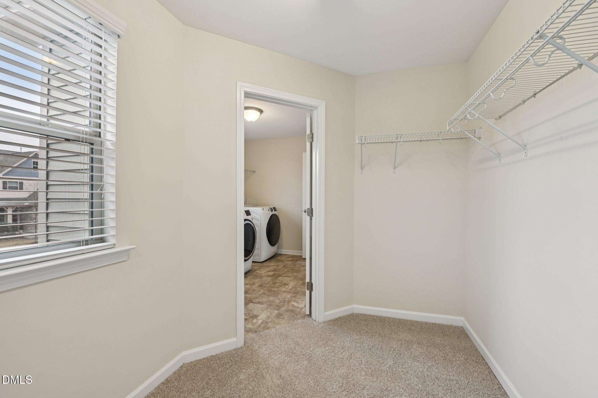 1024 Laredo Lane Durham, NC 27703 - Photo 19 of 32 a room that has a bed in it