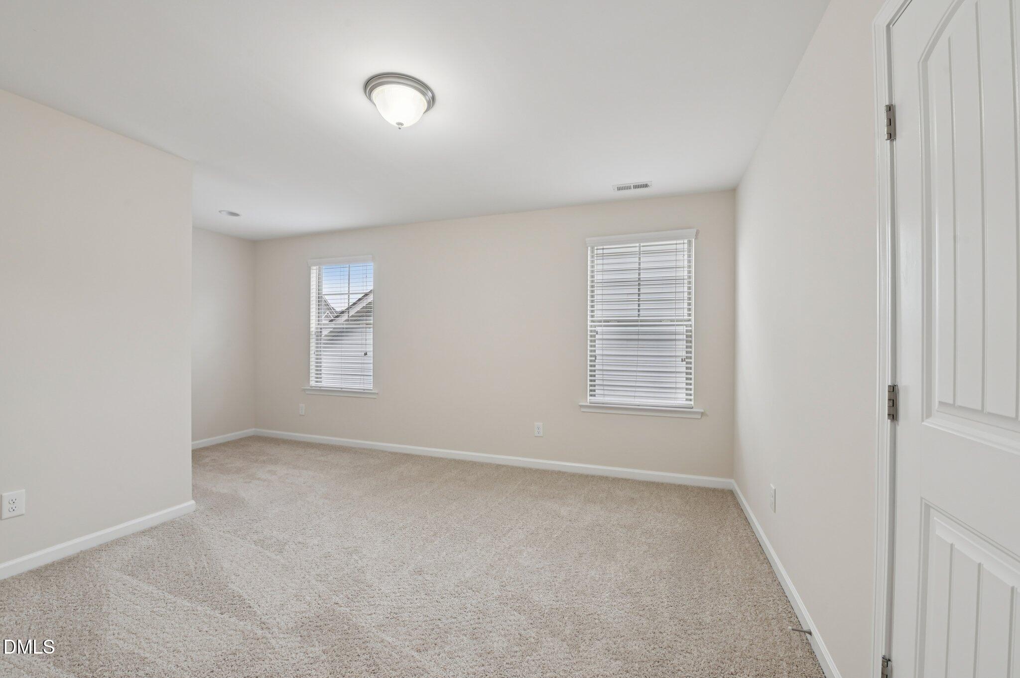 1024 Laredo Lane Durham, NC 27703 - Photo 24 of 32 a view of an empty room with a window