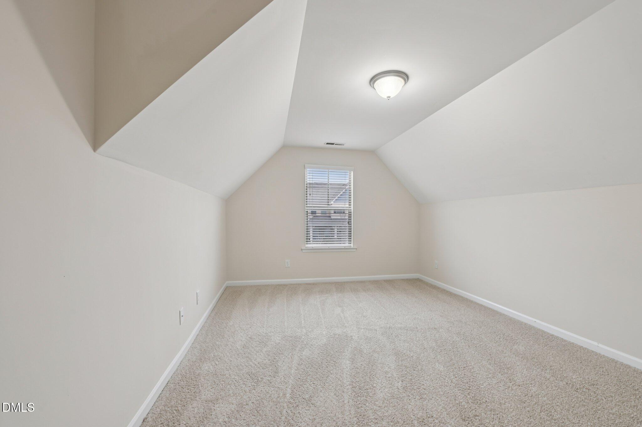 1024 Laredo Lane Durham, NC 27703 - Photo 25 of 32 a view of an empty room with a window