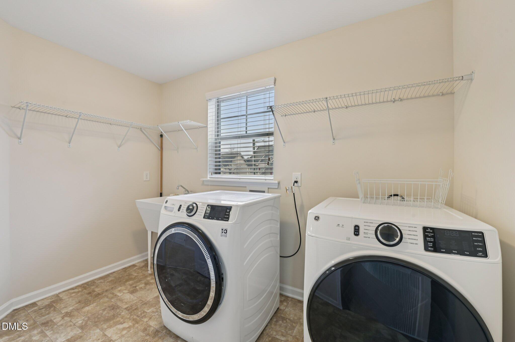 1024 Laredo Lane Durham, NC 27703 - Photo 27 of 32 a utility room with dryer and washer
