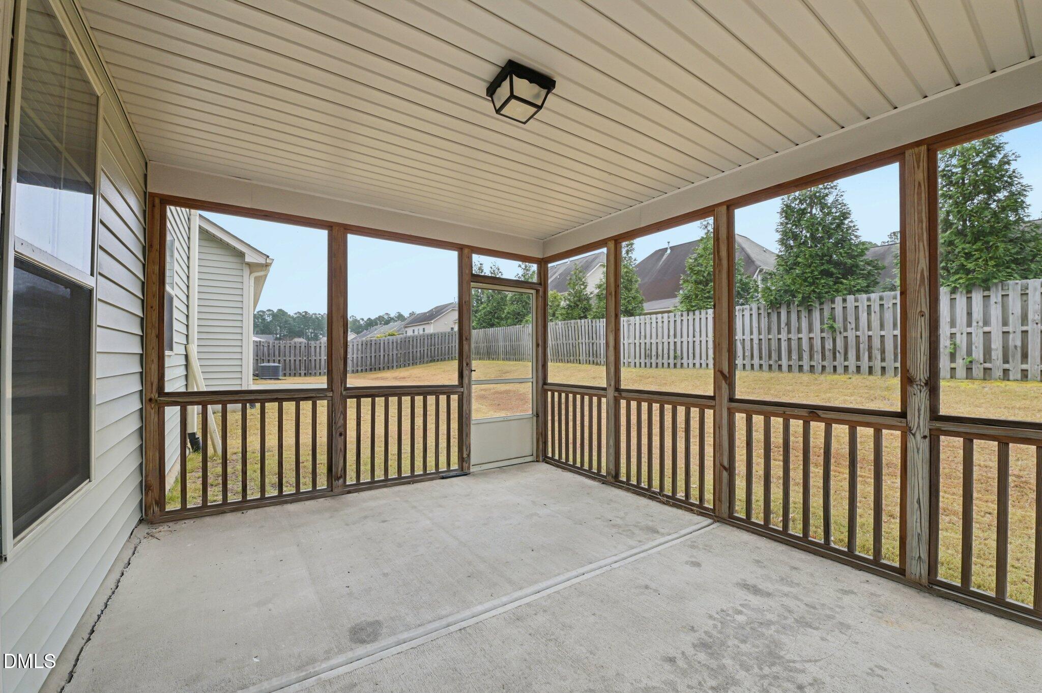 1024 Laredo Lane Durham, NC 27703 - Photo 28 of 32 a view of a porch with wooden floor