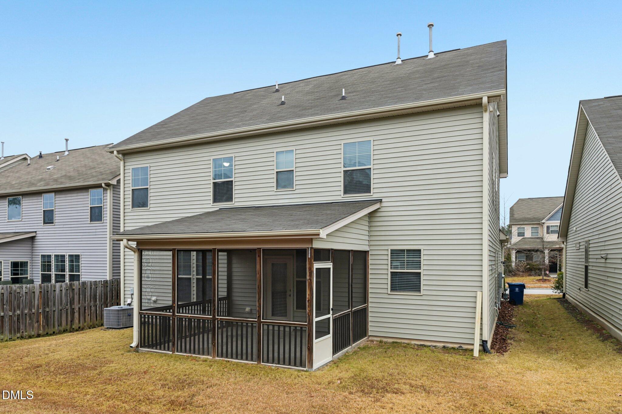 1024 Laredo Lane Durham, NC 27703 - Photo 29 of 32 a view of a house with a door and balcony
